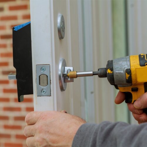 locksmith services fixing a lock
